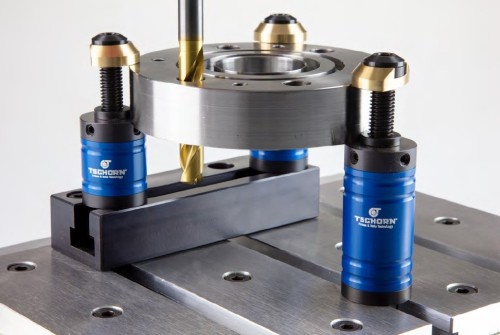 NOVÝ SYSTÉM UPÍNACÍCH ŠROUBŮ PRO UPNUTÍ OBROBKU